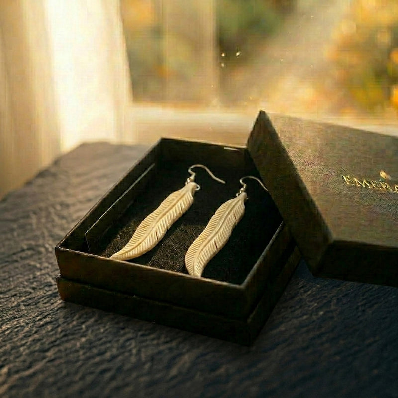 The Featherfall — carved bone feather earrings on sterling silver from Aotearoa, presented ready to gift in an EMBER box. A considered NZ-made keepsake gift for someone who has everything.