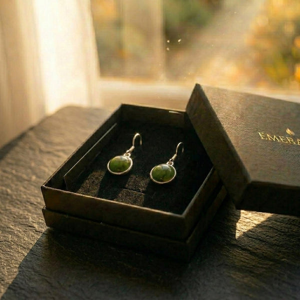 The Pounamu Drop — silver drop earrings set with round pounamu (greenstone) from Aotearoa. A considered NZ-made pounamu jewellery gift for Mum, a milestone birthday or a thank you, presented in an EMBER box.